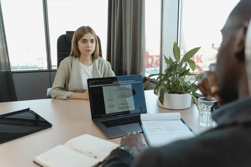 A professional job interview scene in a modern office setting, emphasizing recruitment and career opportunities.