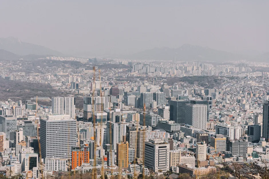 A breathtaking aerial view of the bustling cityscape of Seoul showcasing modern architecture.